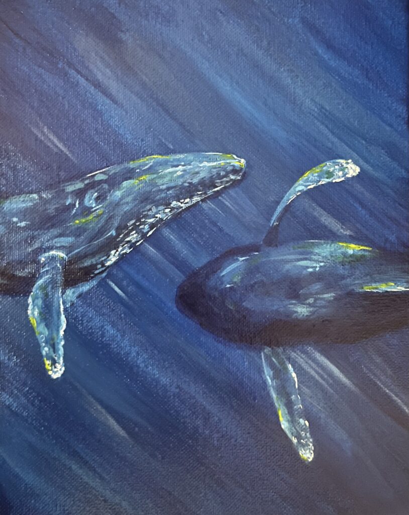 Une peinture de deux baleines sous l'eau